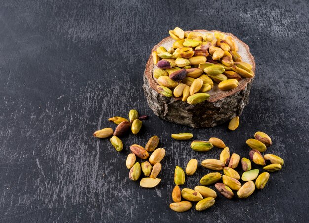 High angle pistachios on a stump