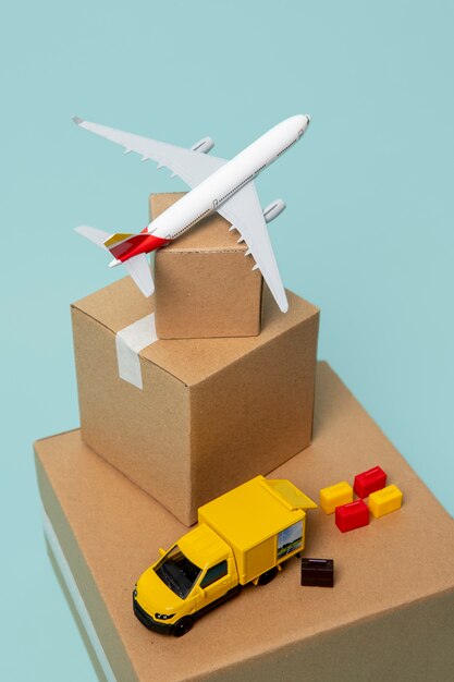 High angle plane and truck with boxes