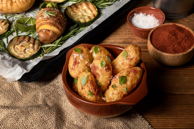 High angle of potato dishes with spices