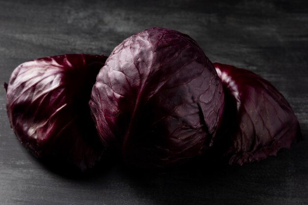 Free photo high angle red cabbages on table