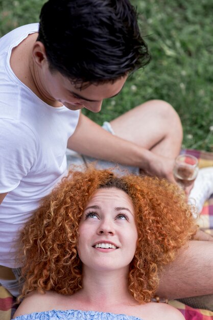 High angle red hair woman looking at her boyfriend