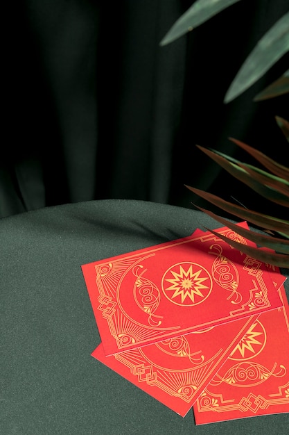 High angle red tarot cards on table