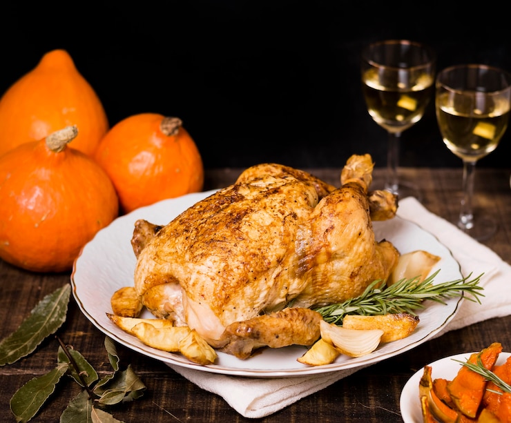 Free Photo high angle of roasted chicken on plate for thanksgiving dinner
