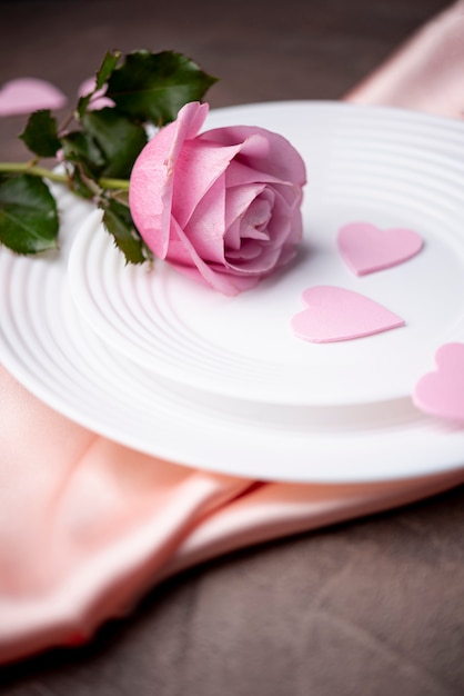High angle of rose on plate for valentines day