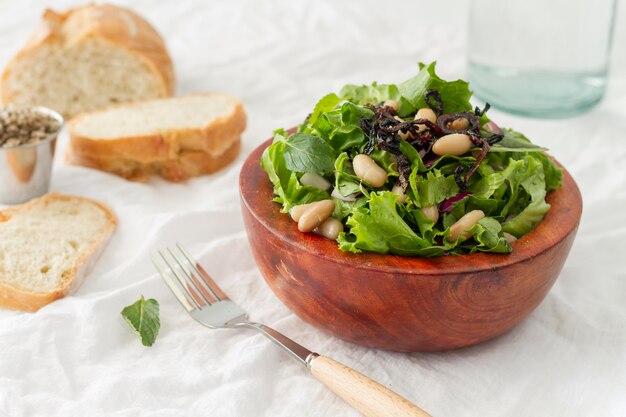 High angle salad with white beans and bread