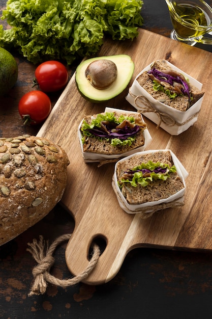 High angle of sandwiches with tomatoes and avocado