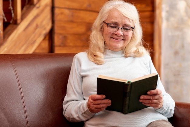 High angle senior female reading