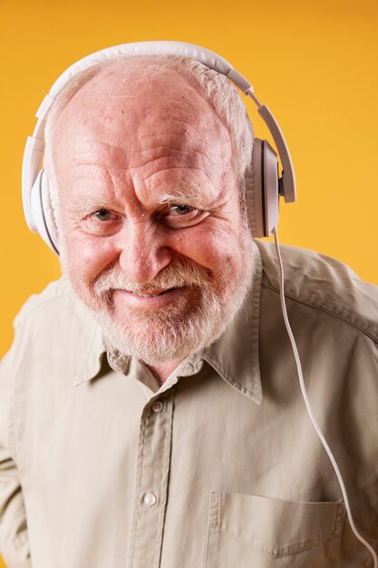 High angle senior male with headphones
