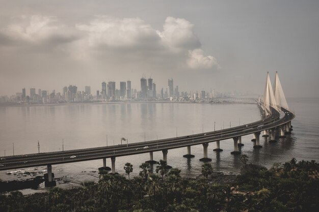 High angle shot of Bandra Worli sealink in Mumbai enveloped with fog