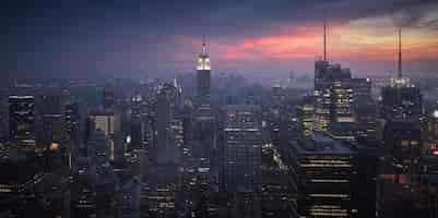 Free photo high angle shot of a beautiful cityscape at sunset in new york city, usa