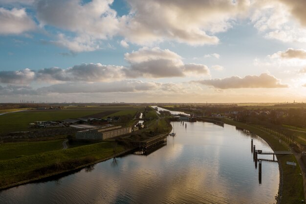 High angle shot of a beautiful river surrounded by buildings in Veere, The Netherlands