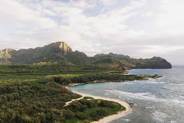 High angle shot of a beautiful seashore with a white cloudy sky