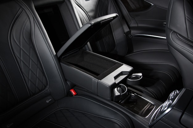 High angle shot of a car's black modern interior - perfect for