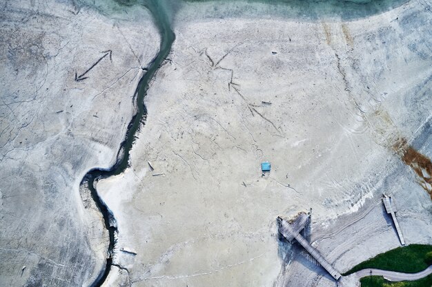 High angle shot of a huge crack on a stone-ground