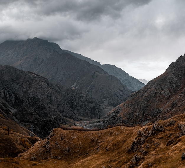 High angle shot of the magnificent mountains and hills captured on a cloudy evening