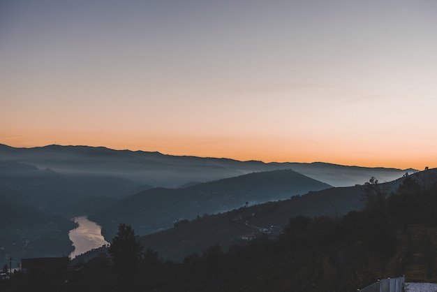 High angle shot of mountains in the mist