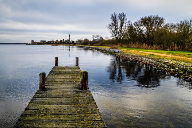 High angle shot of a wooden pier at the Veerse Meer Veere, Zealand, The Netherlands