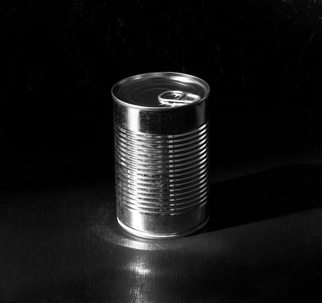 High angle silver tall round tin can