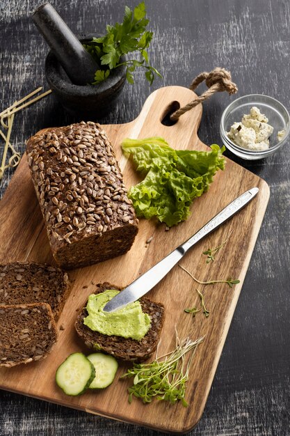 High angle of sliced bread for sandwiches with salad