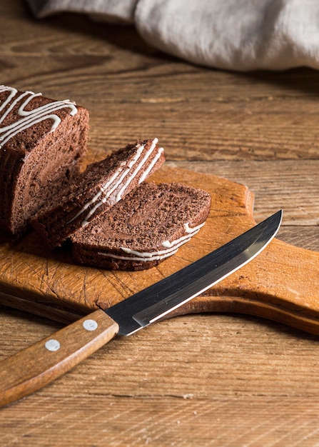 Free photo high angle sliced chocolate roll cake