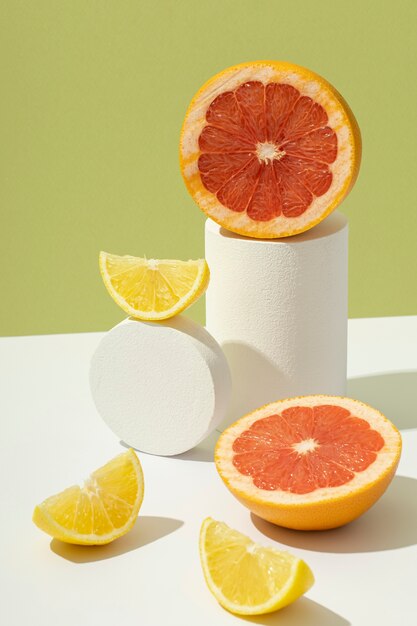 High angle of a sliced orange and a grapefruit