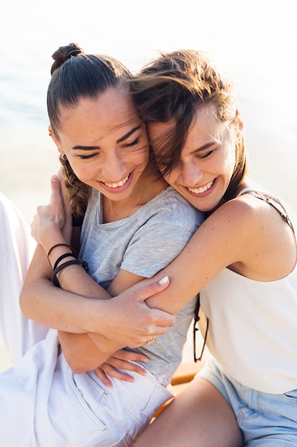 High angle smiley friends hugging