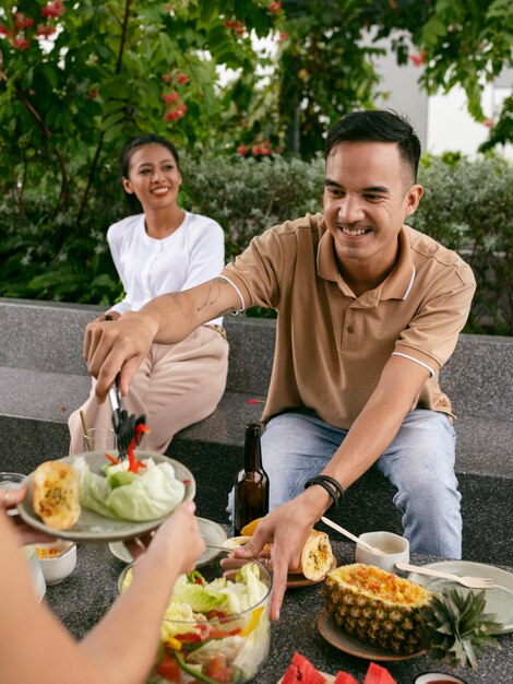 High angle smiley friends with food