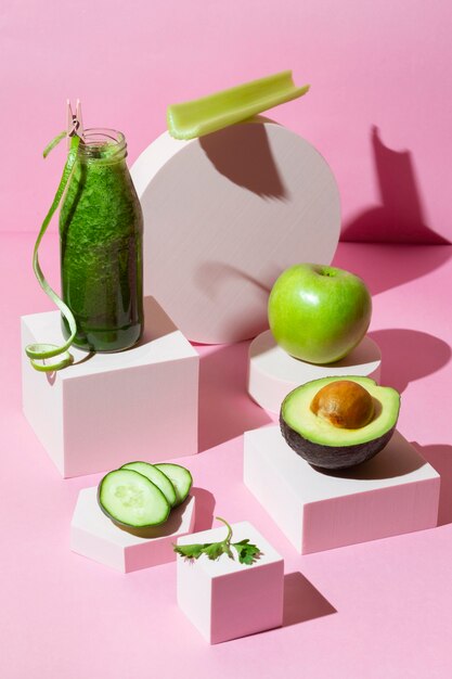 High angle smoothie with cucumbers, avocado and apple