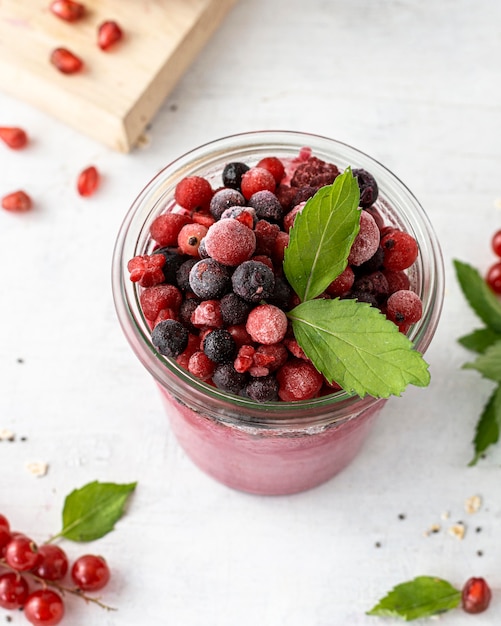 High angle smoothie with frozen fruits