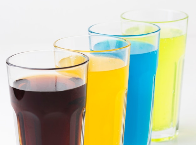 Free photo high angle of soft drinks in glasses