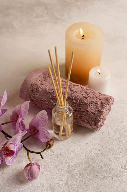 High angle spa concept with candles and flowers