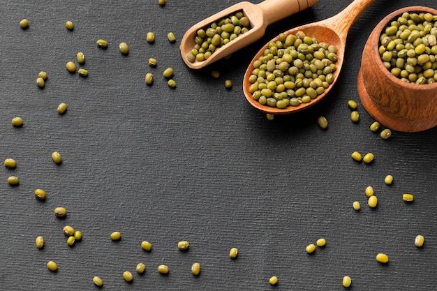 High angle spoon and container with seeds