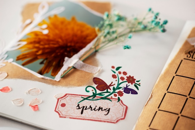 Free photo high angle spring scrapbook with flowers