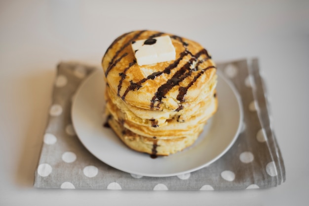 Free photo high angle stack of home made pancakes
