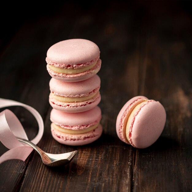 High angle of stack of macarons with ribbon