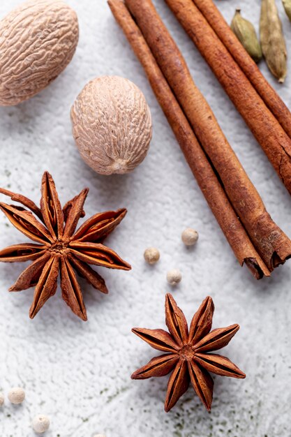 High angle of star anise and nutmeg with cinnamon sticks