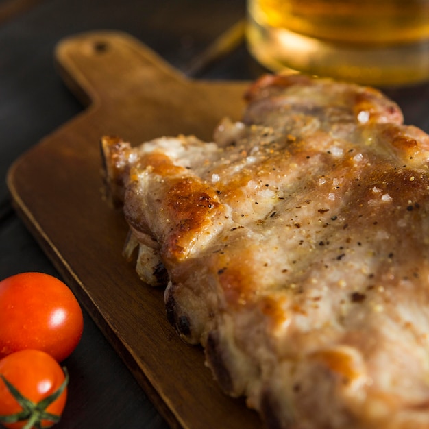 High angle of steak with beer