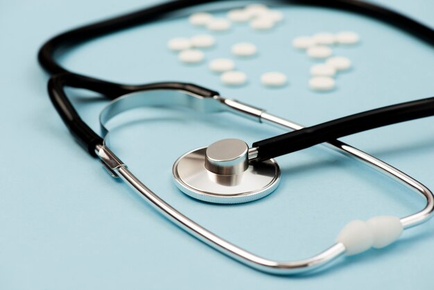 High angle stethoscope on blue background