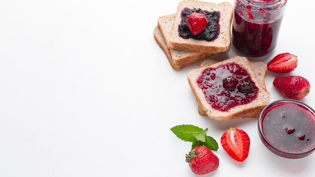 High angle strawberry jam on bread