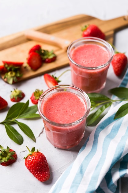 High angle strawberry smoothies in glass