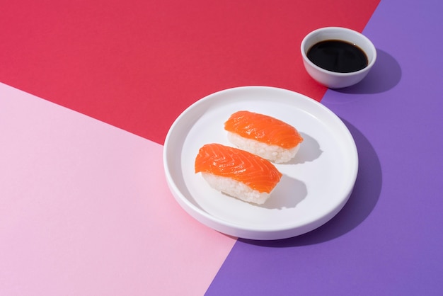 High angle sushi and soy sauce arrangement