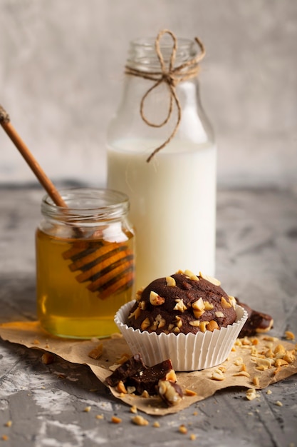 High angle sweet bakery assortment with honey