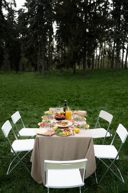 Free photo high angle table arrangement outdoors