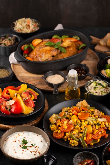 High angle table full of delicious food arrangement