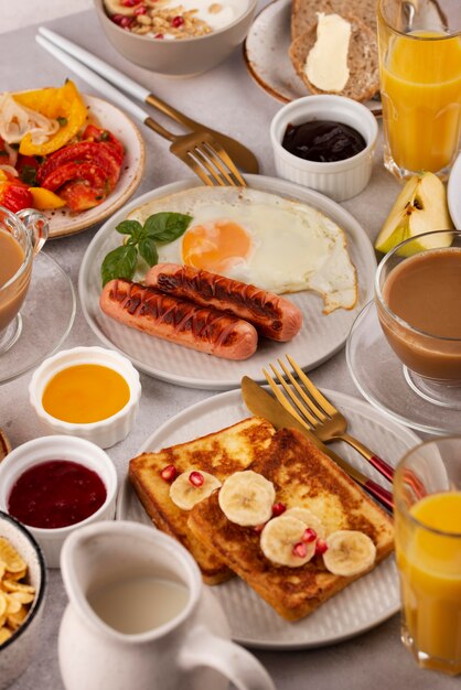 High angle table full of delicious food arrangement