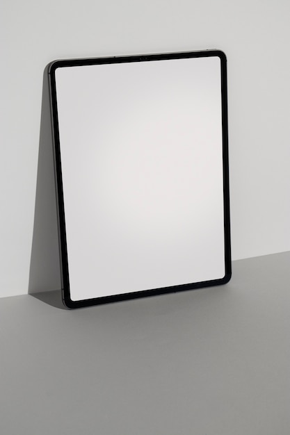 High angle tablet minimal display on grey surface