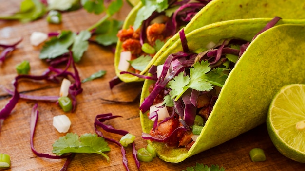 High angle tacos on wooden table