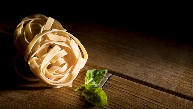 High angle tagliatelle with basil