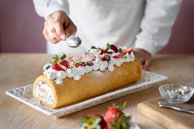 High angle tasty cake with strawberries