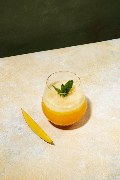 high angle tasty daiquiri cocktail with mint leaf